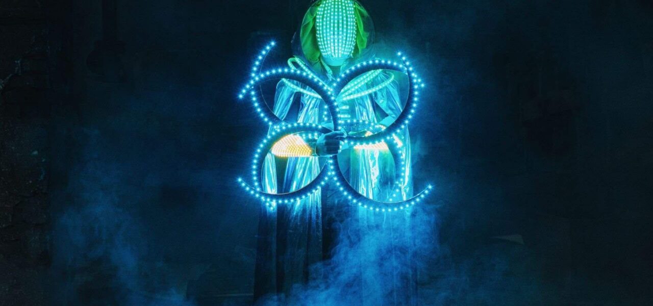 Space-Themed-LED-Dancer-Posing-In-Fog