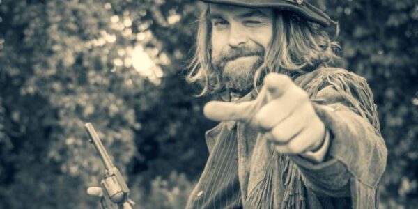 Stunt-Horse-Riding-Performer-Winking-Gun-Slinger