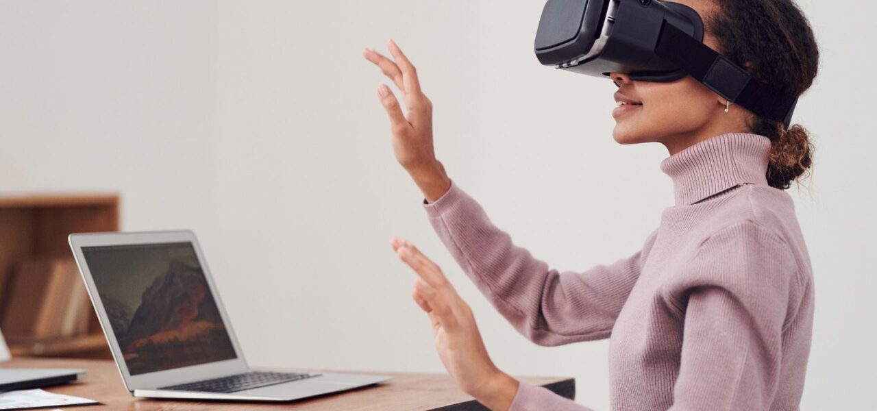 Woman-Using-Virtual-Reality-Headset-For-Work-Meeting