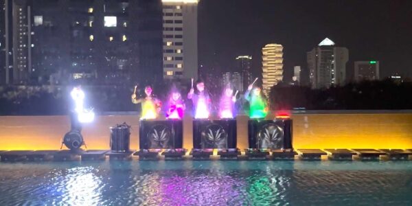 UV-Water-Drummers-With-Skyline