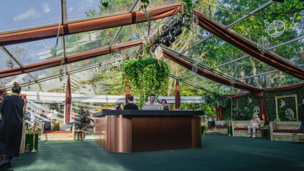 Bronze, copper ceiling draping used on clearspan marquee ceiling.