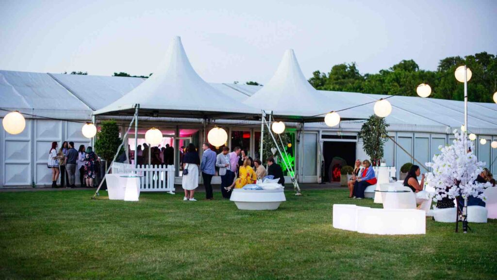 Marquee and outdoor seating area created by our team as part of the event space for company summer party.