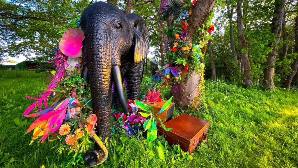 Enchanted garden theme perfect with flower walkabout people for vibrant events.