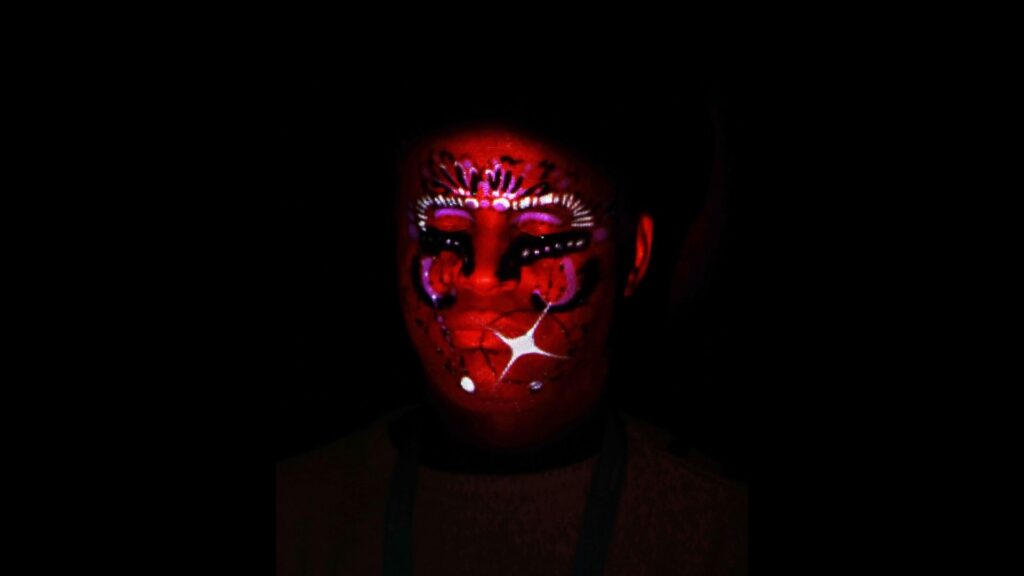 A live face projection with a digital painting overlay