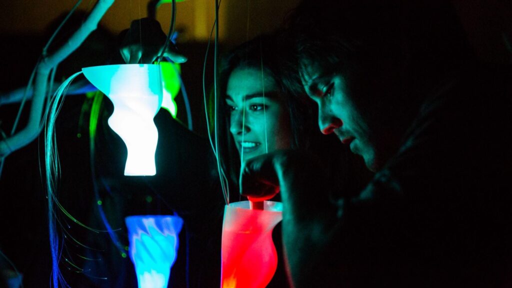 Light art installation involving light projections.
