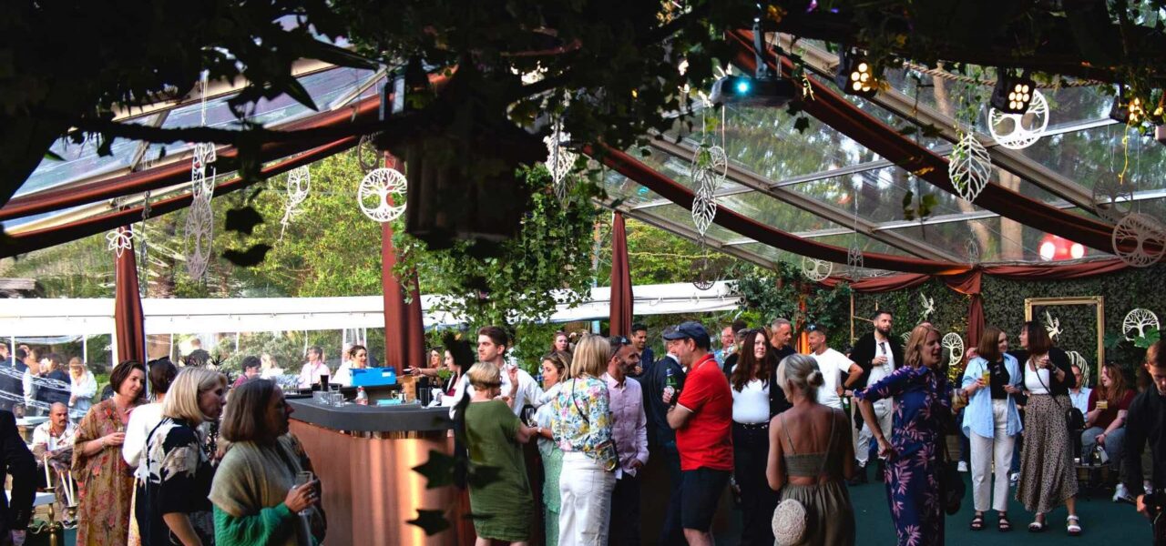 Adults will immerse themselves in an Enchanted Garden Party, shown here inside our fantastical marquee