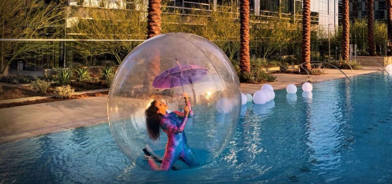 Bubble-Sphere-Acrobat-With-Umbrella