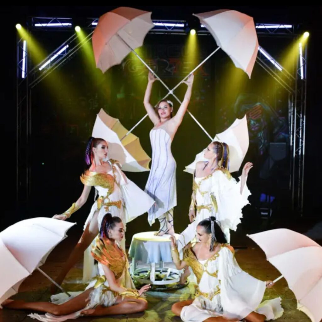 A troupe of umbrella performers during modern bespoke circus show
