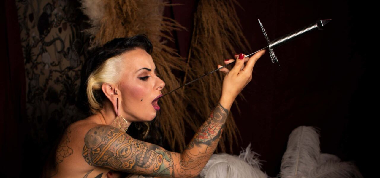 Danger-Themed-Sword-Swallowing-Act