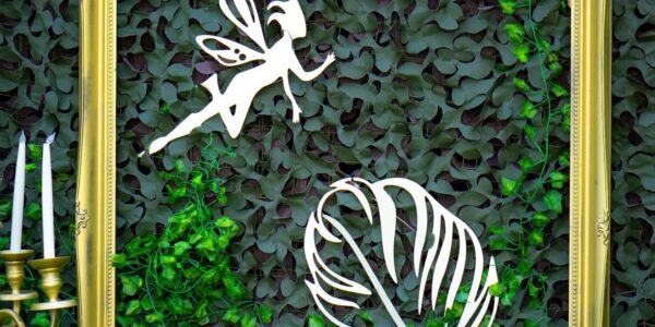 Enchanted-Forest-Themed-Marquee-Foliage-Backdrop-And-Gold-Frame
