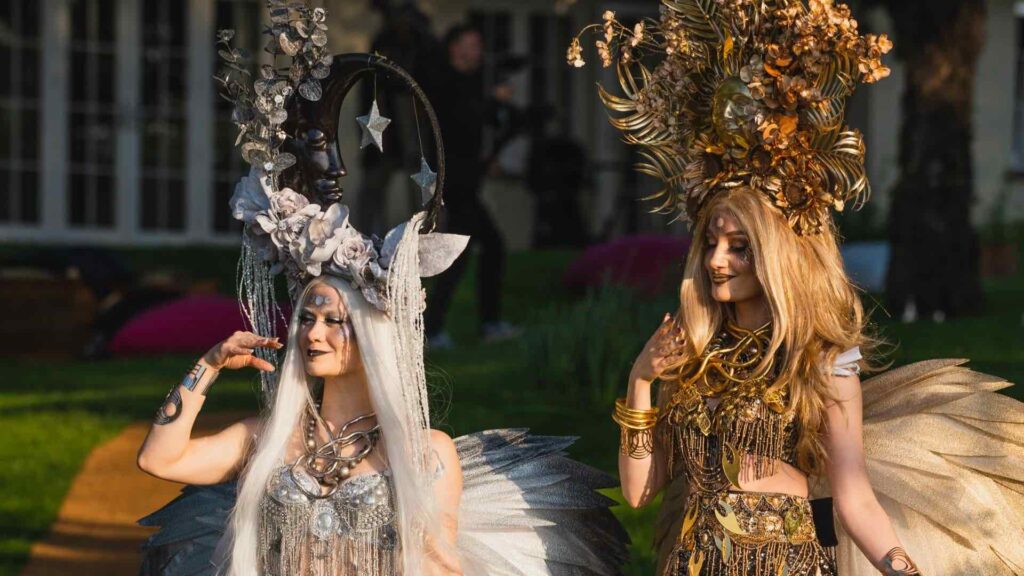 Stunning enchanted walkabout performers dressed in silver and gold celestial themed costume