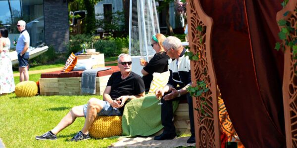 Allow guests to relax in a vibrant oasis with enchanted props and cosy natural pallet seating