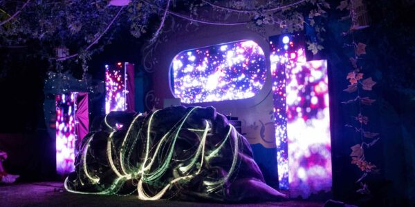 Our custom made set design features illuminated 3D projection bespoke to our clients desires