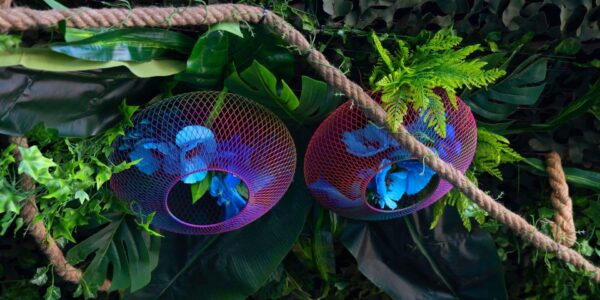We will add unique touches such as these stunning hanging flower props in a net used for an enchanted garden theme