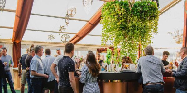Our mystical forest theme utilised focal hanging foliage over our copper bar set in a light and airy marquee