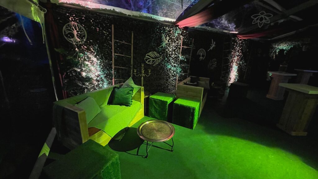 Palette furniture in vibrant green used for an enchanted garden theme