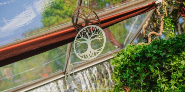 Using ornate enchanted forest theme props featuring nature-inspired elements.