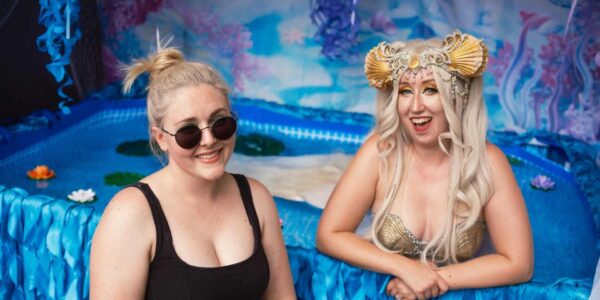 Mermaid-Posing-With-A-Guest