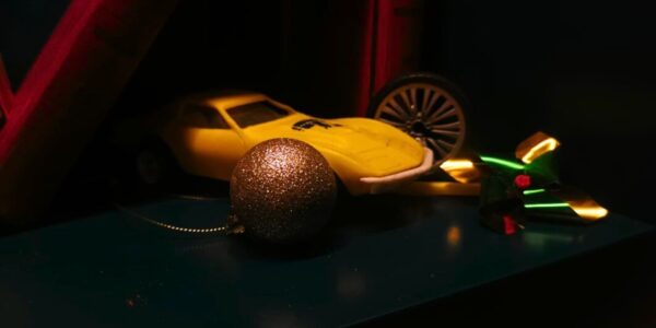 Yellow-Toy-Car-And-Bauble