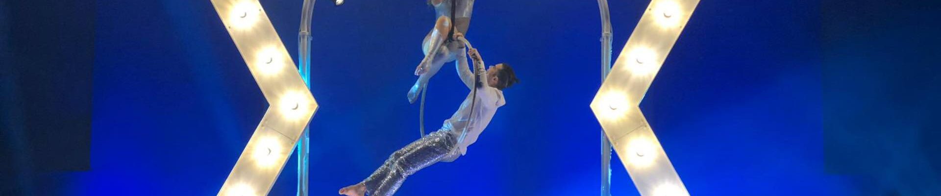Elevate your event with a mesmerising LED star performance by a hoop aerialist! Elevate your event with a mesmerising LED star performance by a hoop aerialist!