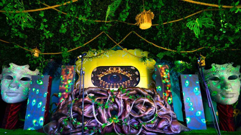 A stage and set design we created for our private island enchanted garden themed event. Featuring inbuilt 3d projection as per the client's request alongside a unique artist performance space.