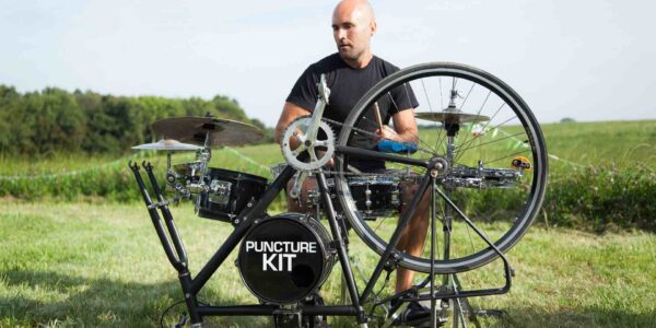 Feel the rhythm as this skilled performer plays a drum kit made from a bike perfect for corporate event entertainment.
