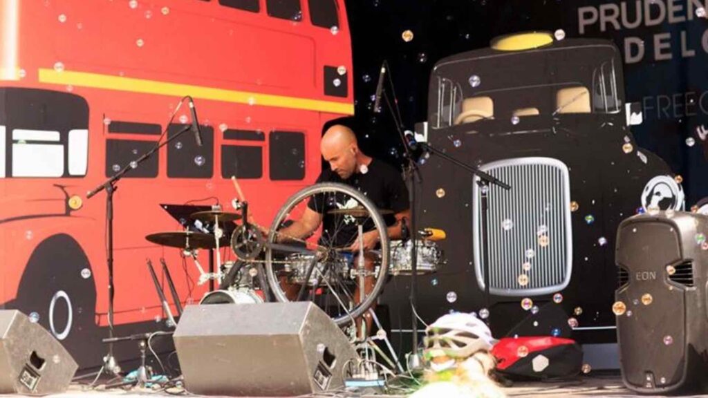 Unconventional bike drum kit in action, live show.