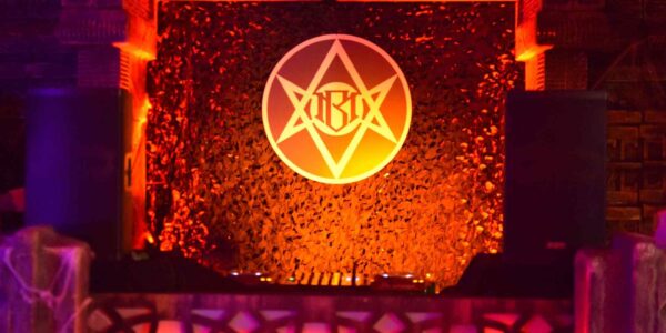 Cult symbols and illumination can adorn your event space.