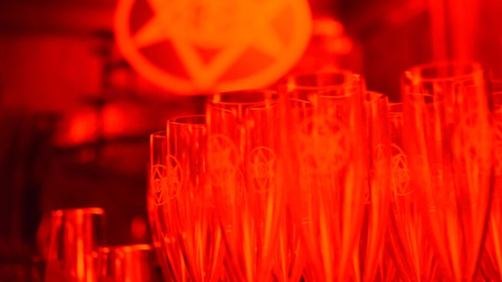 Close-up of 'Illuminati' style glasses used for bars at Cult Awakening themed Halloween party.