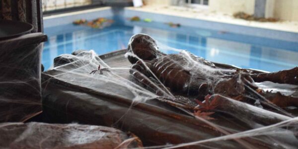 Cult-Awakening-Halloween-Mansion-Party-Skeleton-Prop-Pool-Room