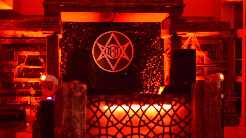 Temple and 'Illuminati' style DJ set design used for Cult Awakening Halloween Mansion party.