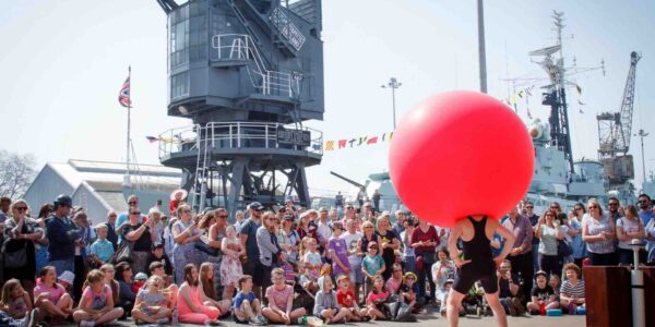 Hire a balloon performer for your next family friendly event to please audiences of all ages! UK based and available internationally.