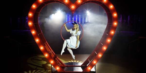 Alice in Wonderland themed performer inside our glowing LED heart available for your events.