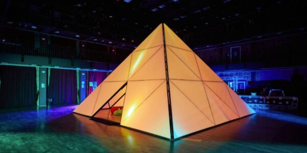 Hire our talented team behind these bespoke 3D designs. This pyramid features a 3d projection show that spectators can view whilst laying down inside.