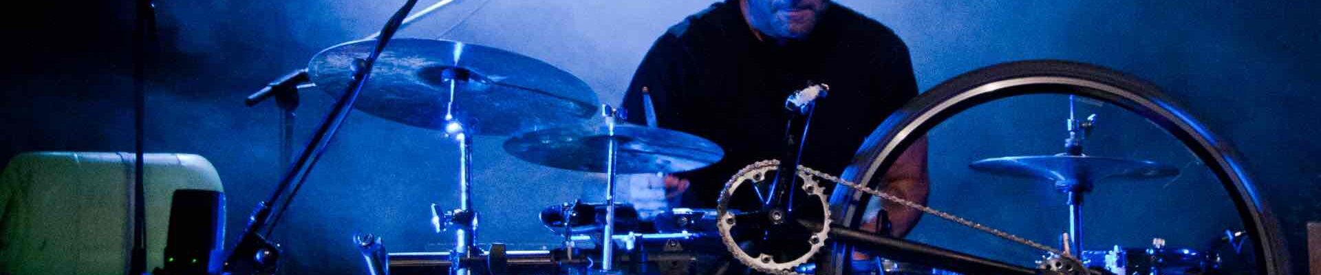 Experience the fusion of art and music as a passionate performer takes center stage, playing an extraordinary drum kit ingeniously built from a bicycle. Experience the fusion of art and music as a passionate performer takes center stage, playing an extraordinary drum kit ingeniously built from a bicycle.