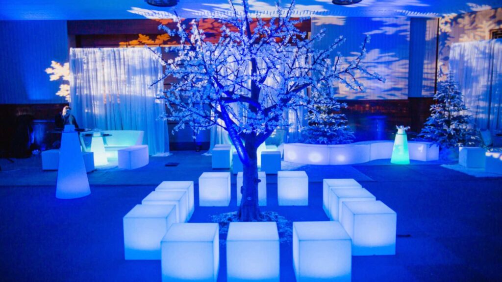 A Winter Wonderland themed tree prop with seating.