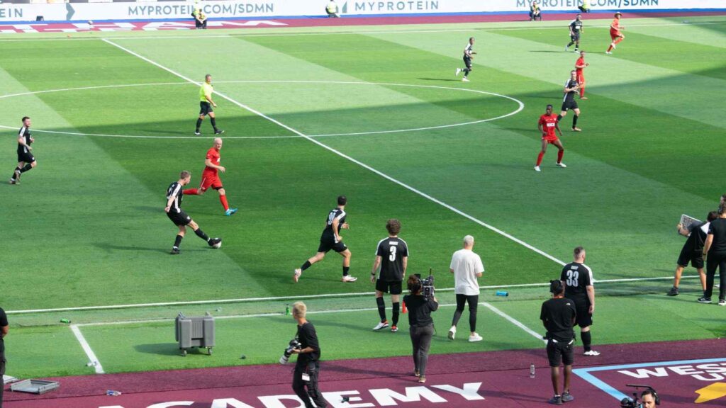 Calfreezy pushing forward and passing the ball.