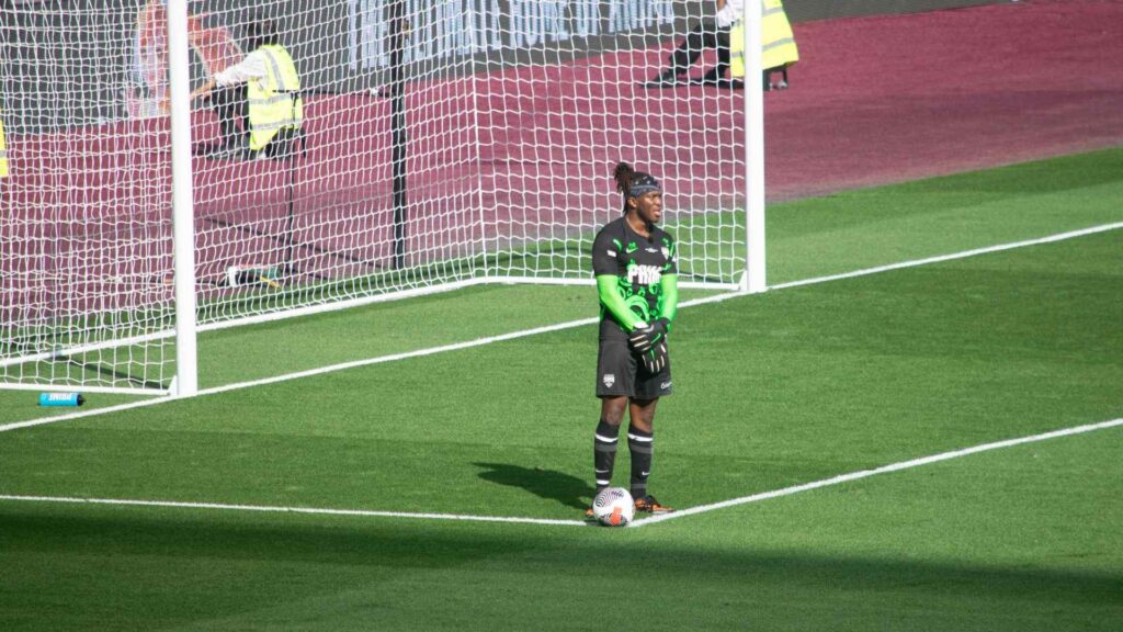 Sidemen FC Goalkeeper, KSI standing in front of goal preparing for goal kick.