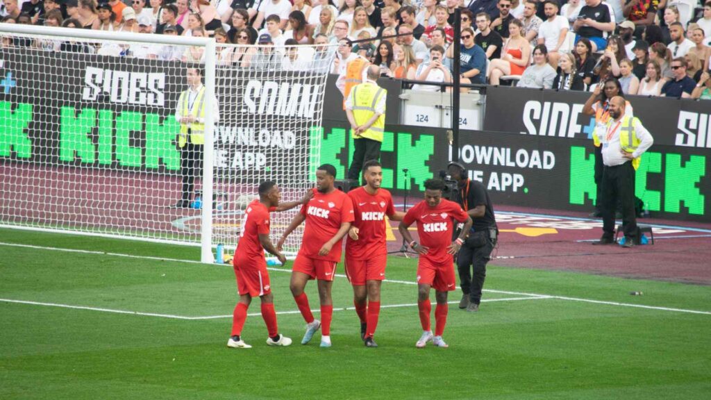 YouTube Allstars - Filly, Chunkz, Niko and Speed celebrating Niko's goal, taking the score to 7-5.