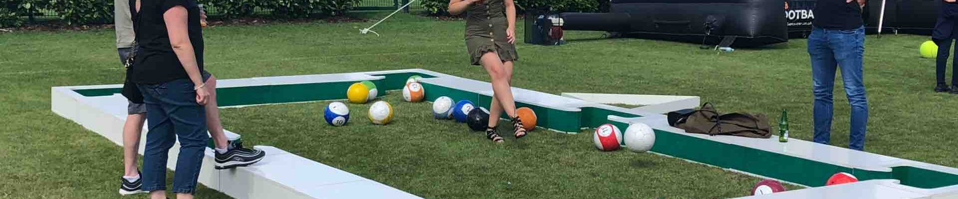 Adults-Playing-Football-Pool Adults-Playing-Football-Pool