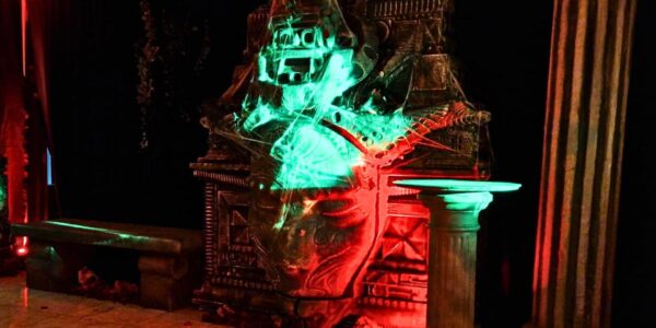 3D projection covering bespoke made temple for cult themed party.