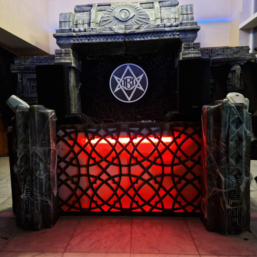 Bespoke DJ booth created with cult symbolism for a horror event.