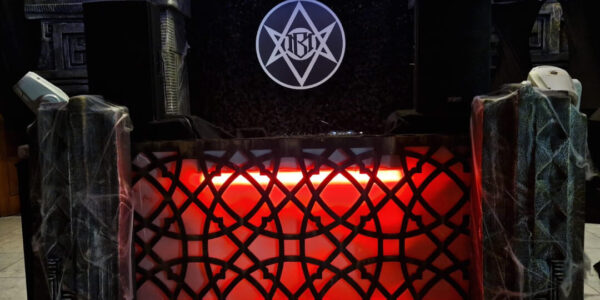 We can craft a tailor-made set design to accommodate your entertainment, including features like this DJ set, seamlessly integrating your logos and design elements.