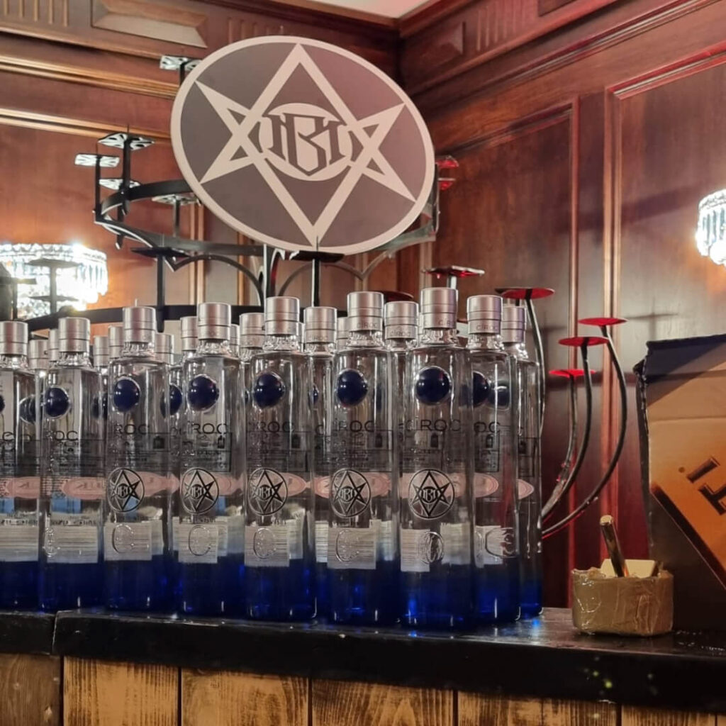 Unique cult logo and drinks for a custom cult horror event in a mansion.