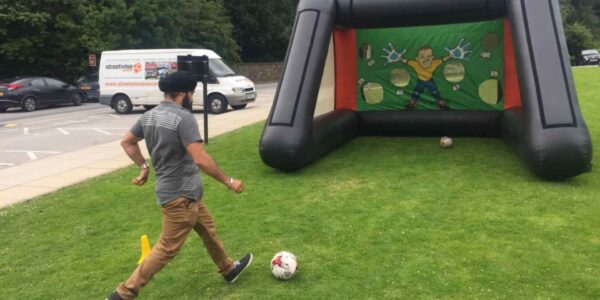 Playing-Football-With-Inflatable-Goal