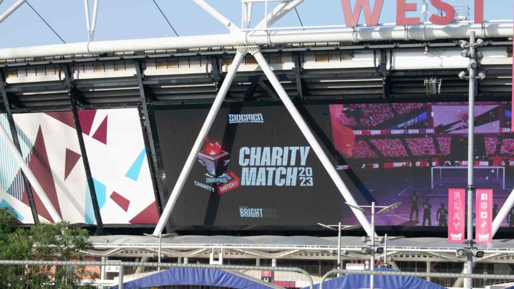Close-up of Sidemen Charity Match 2023 digital display on the exterior of the Queen Elizabeth Olympic Park Stadium (London Stadium).