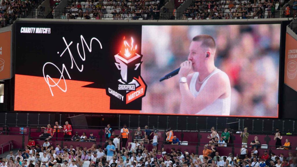 Aitch's halftime performance was also streamed to the screens in the stadium for fans to get a closer look at the performance.