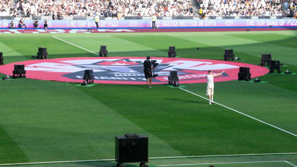 Aitch performing on approach to centre circle.