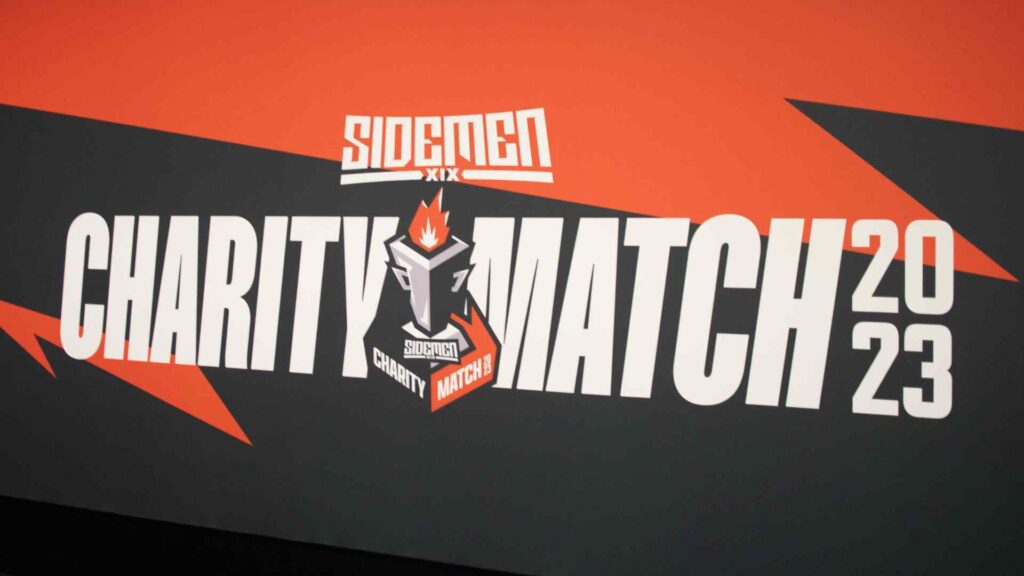 Sidemen Charity Match 2023 branded red and black banner in player tunnel.