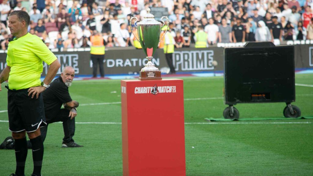 Charity Match Winners Trophy placed on stand prior to trophy lift.